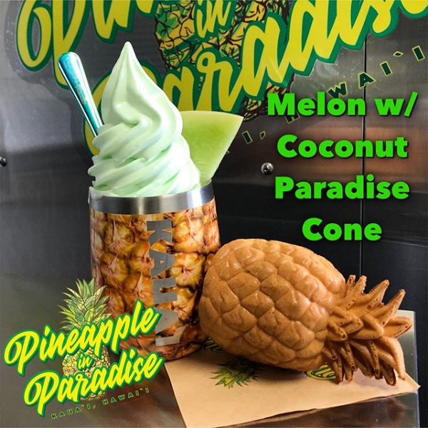 Melon whip in a pineapple tumbler with a paradise cone on the side